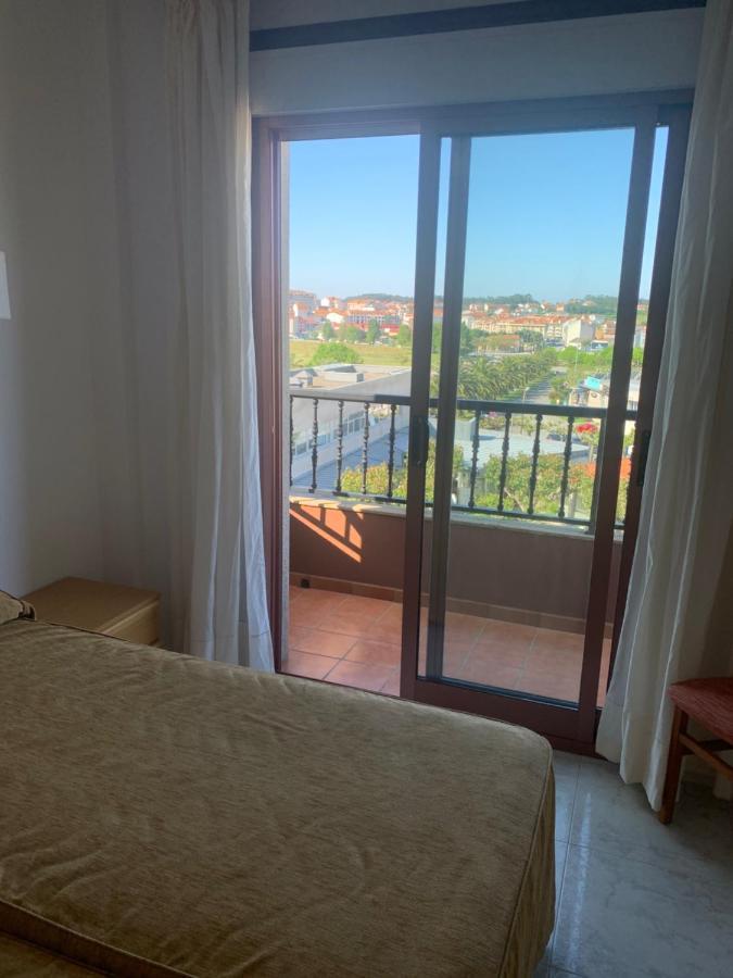Apartamentos Corea Portonovo Bagian luar foto